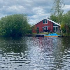 Ferienhaus am See, (1-7 Pers.) Tretboot, Sauna, Whirlpool, Kamin, Kinderspieleparadies