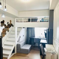 "Stylish Loft Condo with High-Speed WiFi at Avida Towers"