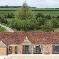 Idyllic Grade II Listed Barn with River Frontage