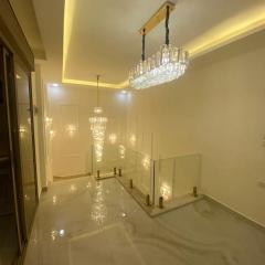 1 massive Bedroom with King Bed with Terrace with view on Irbid City, Private and massive Living room and Private Kitchen, the most luxurious apartment in Irbid its perfect option for Newley married couplesمن افخم الشقق في اربد وخيار ممتاز للمتزوجين الجدد
