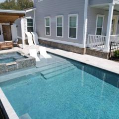 Walk to Beach with Heated Pool Spa views & oak trees