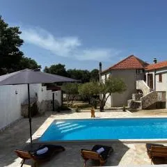 Family-friendly apartments with swimming pools Radasinovci, Biograd - 22312