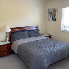 Spacious and bright queen bed room with private bathroom