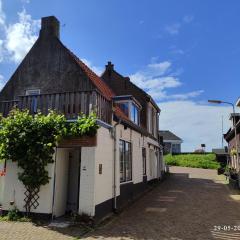 The cosy little house with the sundial