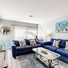 Water-view dog-friendly home with outdoor space & entertainment options