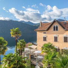 Casa delle Palme con terrazza sul lago e spiaggia