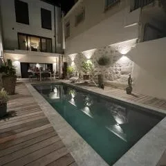Chambre dans maison de ville avec piscine et garage en centre ville