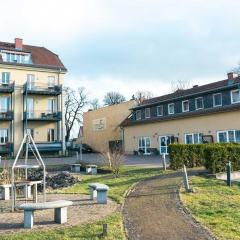 Appartement in Rheinsberg mit Garten und Seeblickbalkon