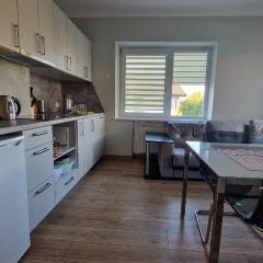 Apartamentai prie parko