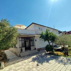 Apartments with parking space Rab - 23298