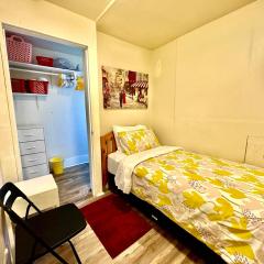 Tiny Private Room at the Upper Level of a Big House with Shared Bathroom