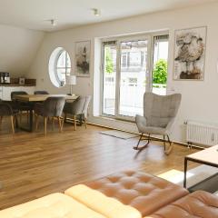 LIGHTHOUSE HOMES - moderne Ferienwohnungen mit Terrasse am Kirchenplatz