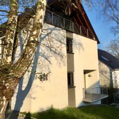 Modernes Ferienhaus mit 2 Balkonen, Terrasse und Garten !