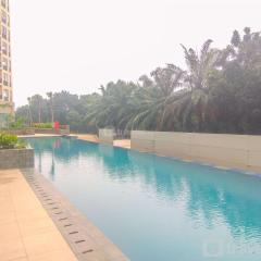Modern Look and Homey 2BR Transpark Cibubur Apartment near Mall By Travelio