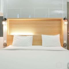 Fully Furnished with Comfortable Design 2BR Harco Mangga Besar Apartment By Travelio