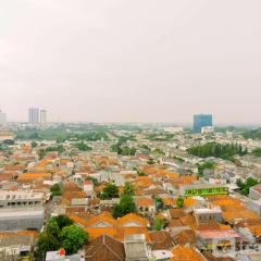 Fancy and Simply 1BR Apartment at M-Town Residence By Travelio