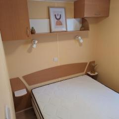 Mobilhome tout confort dans domaine boisé