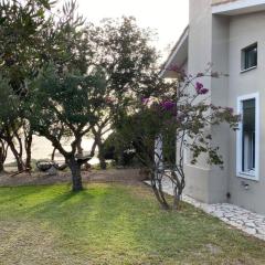 Secluded seaside villa w garden sea-sunset view