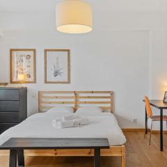 Central Lux 2BR Apt with City Views & Balcony