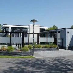 Breskens Chalet TIMEOUT Breskens mit Zaun Hausnr B26