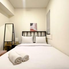 Clean and Homey 2BR at Meikarta Apartment By Travelio