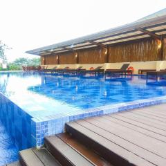 Elegant Studio at Azalea Suites Apartment By Travelio