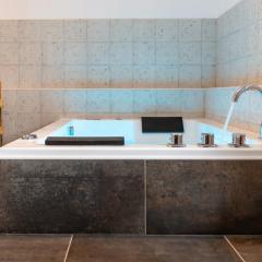 Appartement Premium jacuzzi terrasse climatisation