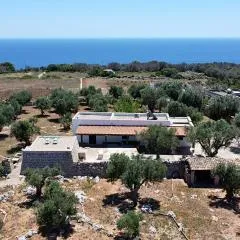 Villetta Paduli - Immersa nel Verde con Vista Mare e Giardino Privato