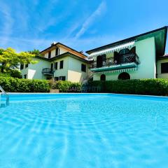 Parigi Apartment - 200m dal Lago con Vista piscina