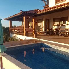 3Suítes, piscina e vista do mar em condomínio pé na areia - pátio compartilhado