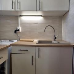 Garsoniera Auchan Titan