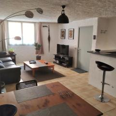 Appartement 55 m2 proche commerces et parking