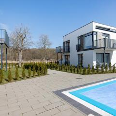 Paraiso Nadmorskie Apartamenty z Basenem i Parkingiem by Noclegi Renters