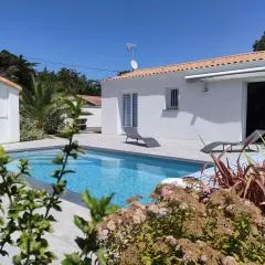 Maison Neuve à Saint-Jean-de-Monts avec Piscine Chauffée, Jardin, et Proche Plage - FR-1-323-409