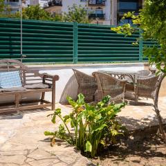 AT077 Planta baja con jardín privado