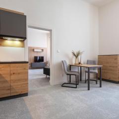 ALURE RESIDENCES 10 - 24h self check-in & private parking next to the apartment building included, CITY CENTER right on SNP Square in a quiet passage, new building, best deal in town