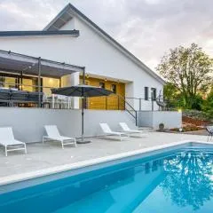 Villa Bellavu for 8 people with playground & sea view in Rakalj