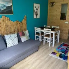 Studio mongie aux pieds des pistes avec balcon