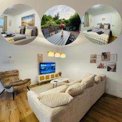 Charmante Ferienwohnung in Scharbeutz -Ihr perfektes Zuhause am Meer! Terasse, Parken & Strand! W1