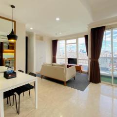 Spacious and Combined 2BR at Menteng Park Apartment By Travelio