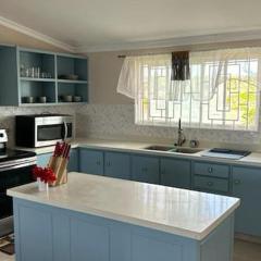 Welcome to Hope Winds, a charming property ranch-style house on a seren