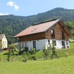 Huis 3landenpunt AT-SLO-IT bij de piste