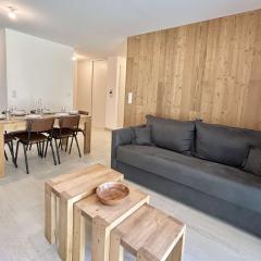 Appartement Neuf 3 Pièces avec Terrasse et Jardin, Proche Remontées Mécaniques, Parking Inclus - FR-1-597-179