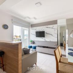 Apto moderno com churrasq. a 600m da praia COM305