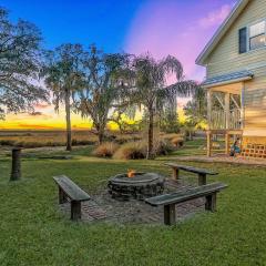 Inviting waterfront cottage w separate garage apartment and stunning marsh view