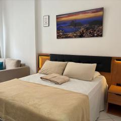 Studio moderno com vista mar