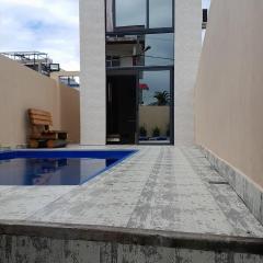 Appartement avec piscine à pomponette