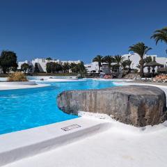 Charming Flat in Los Molinos with Terrace & Pools, Near Playa Bastian