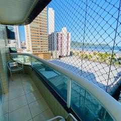 Pé na areia Guilhermina