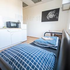 Snug room close to metro Palmovka